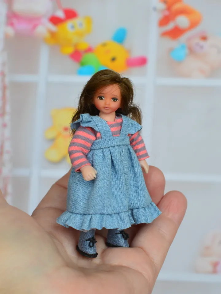 Miniature doll. Doll girl. Doll for a dollhouse.1 12 scale.