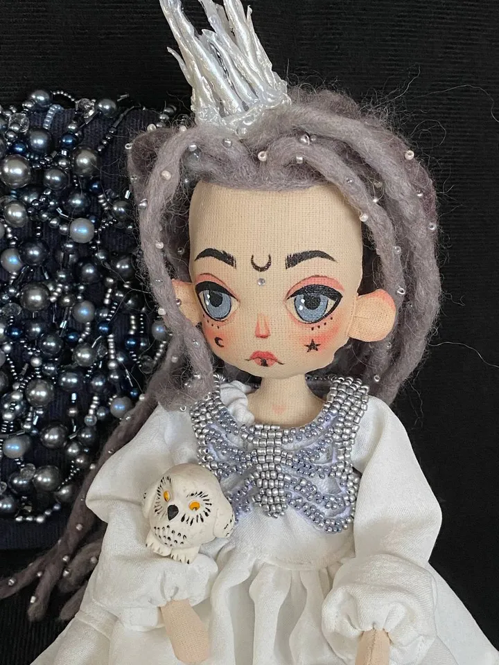 White Queen doll with dreadlocks and tattoos