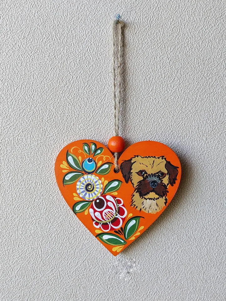 Wooden heart with painting. Border terrier
