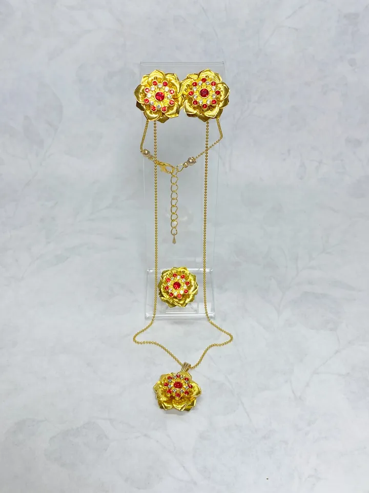 Set of jewelry with red rhinestones. Handmade. Jewelry.