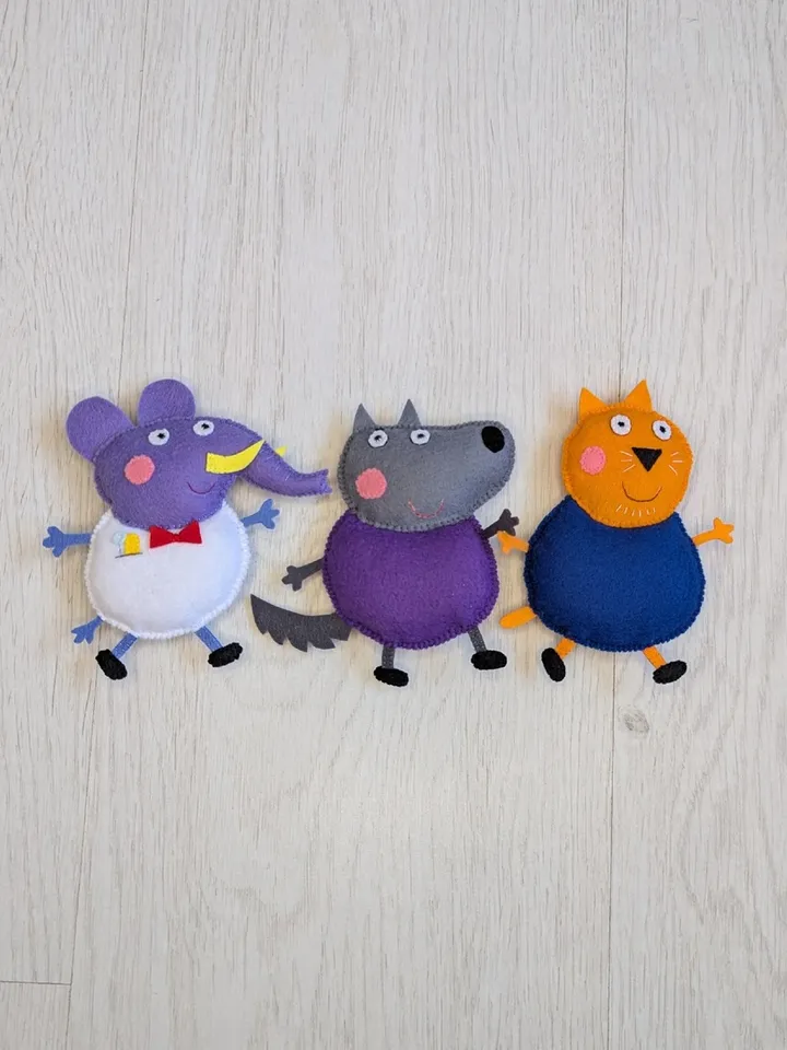 Doctor Elephant, Papa Wolf and Papa Cat from the cartoon Peppa Pig felt toys set