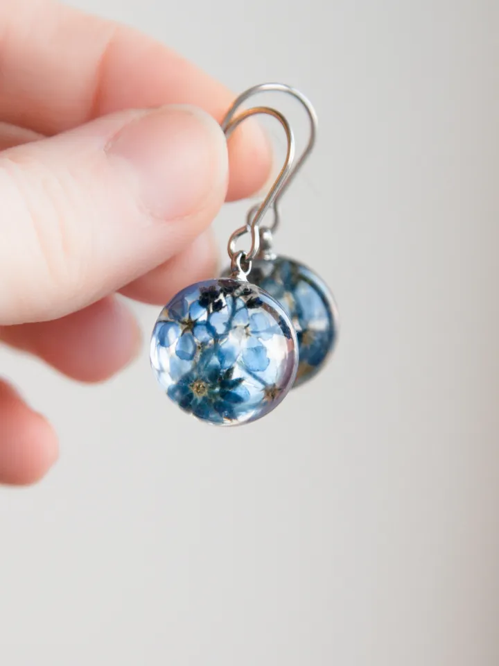 Forget-me-not sphere earrings. Blue dangle resin earrings