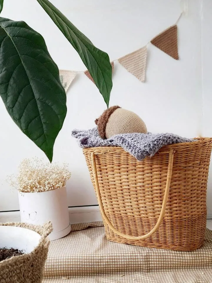 Stuffed biege acorn toy for Home decor. Acorn in Scandinavian style. Decoration of apartments and houses. Universal gift