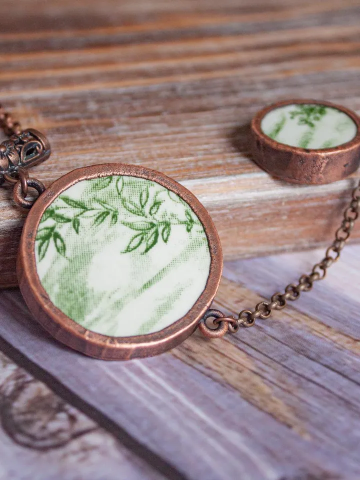 Unique handmade porcelain pendant in a copper frame made using the electroforming process