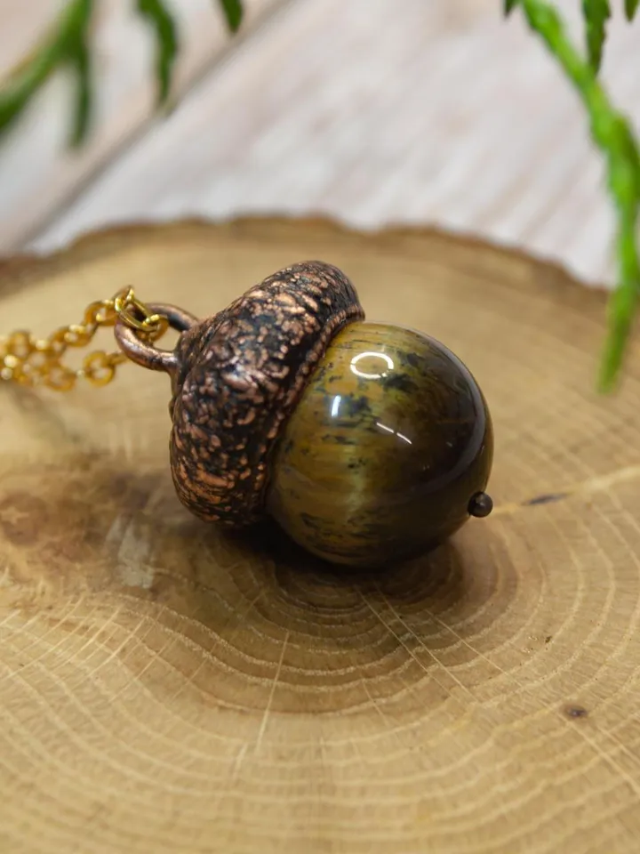 An original handmade electroformed copper pendant made from natural acorn caps in a single copy.