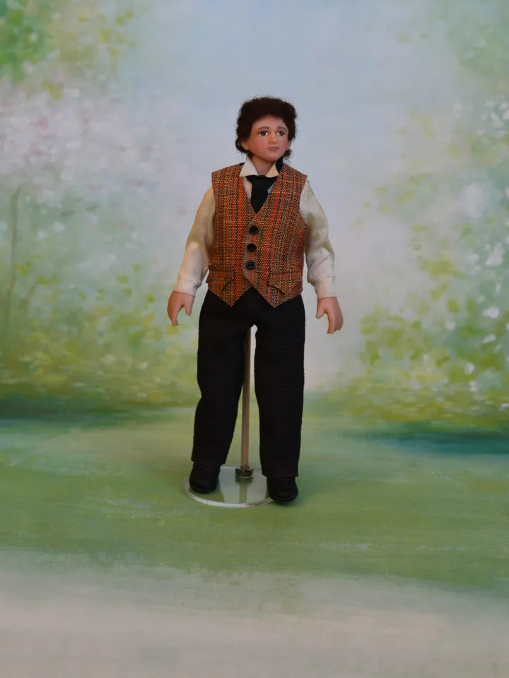 Miniature gentleman doll in 12 scale for a Victorian dollhouse.
