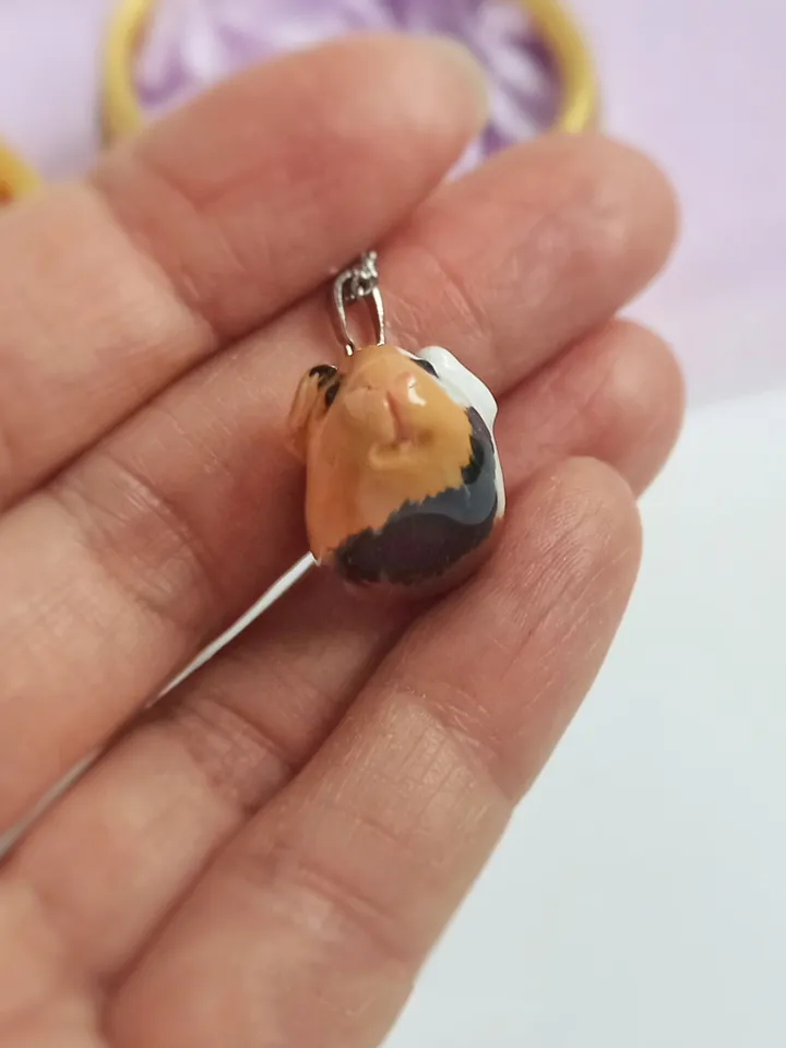 a Guinea pig necklace (US discount)
