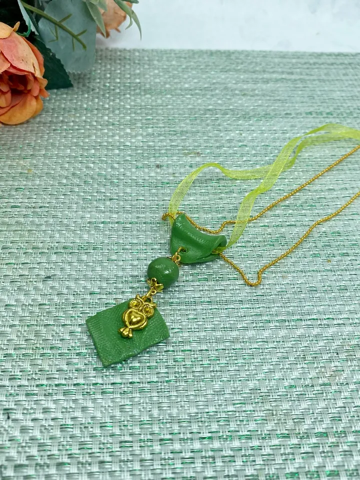 Handmade pendant on a chain. Handmade jewelry.