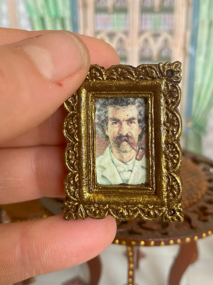A set of photo frames for a dollhouse. Dollhouse miniature. 1:12. Dollhouse accessories.