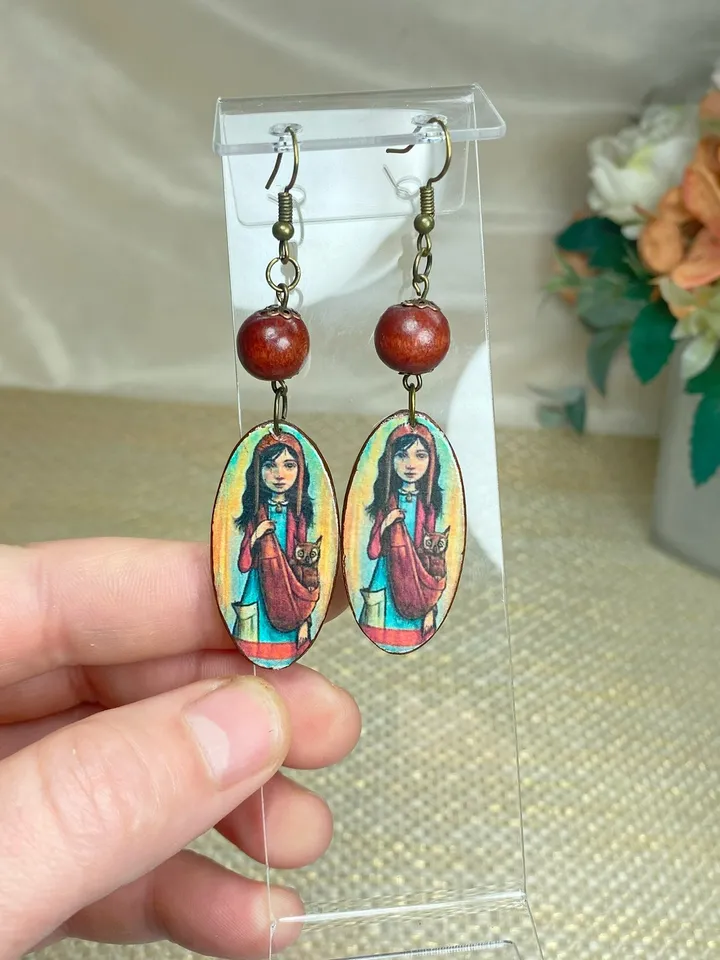 Handmade earrings. Author's design. Jewelry.Earrings with a picture of a girl. Wooden earrings.