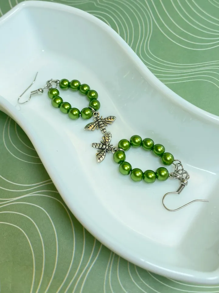 Earrings with green flies. Handmade jewelry.