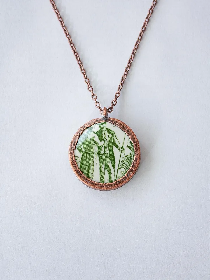 Unique handmade porcelain pendant in a copper frame made using the electroforming process