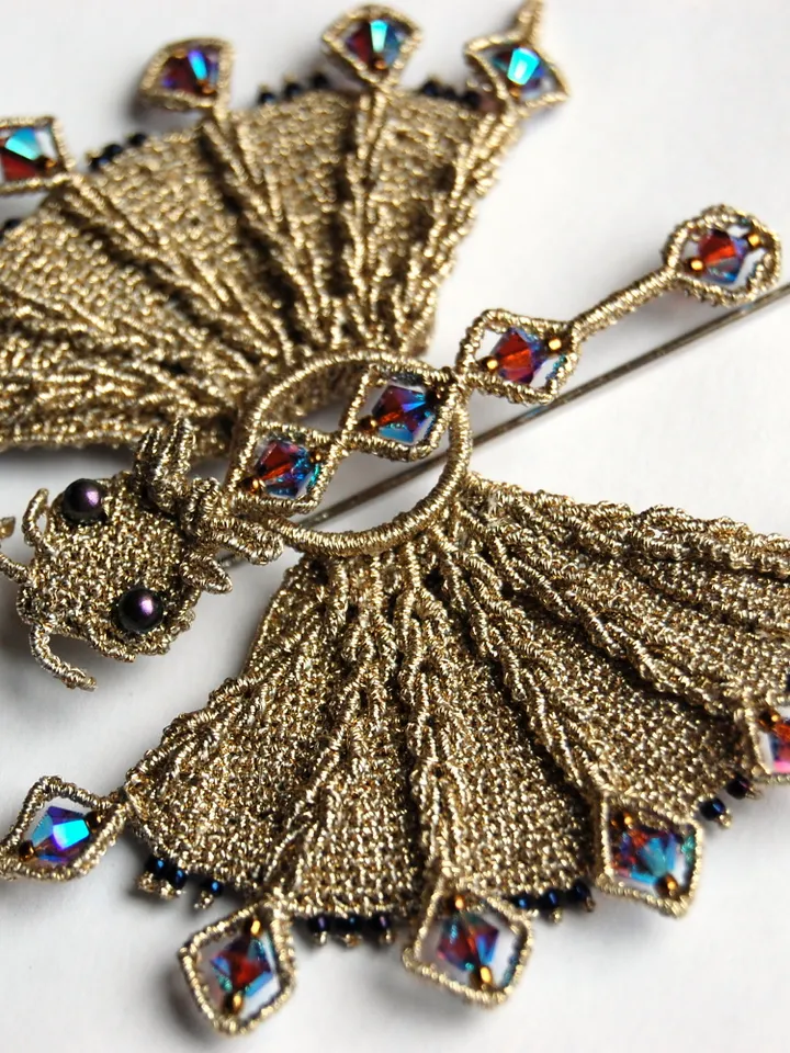 Elegant Bronze Dragon Micro-Macramé Brooch with Swarovski Crystals