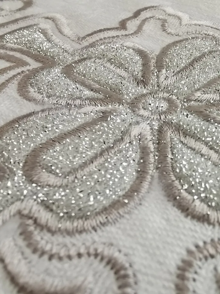 "Trapunto" designs for machine embroidery.