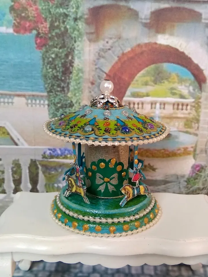 Miniature carousel. Dollhouse miniature.1:12 scale.