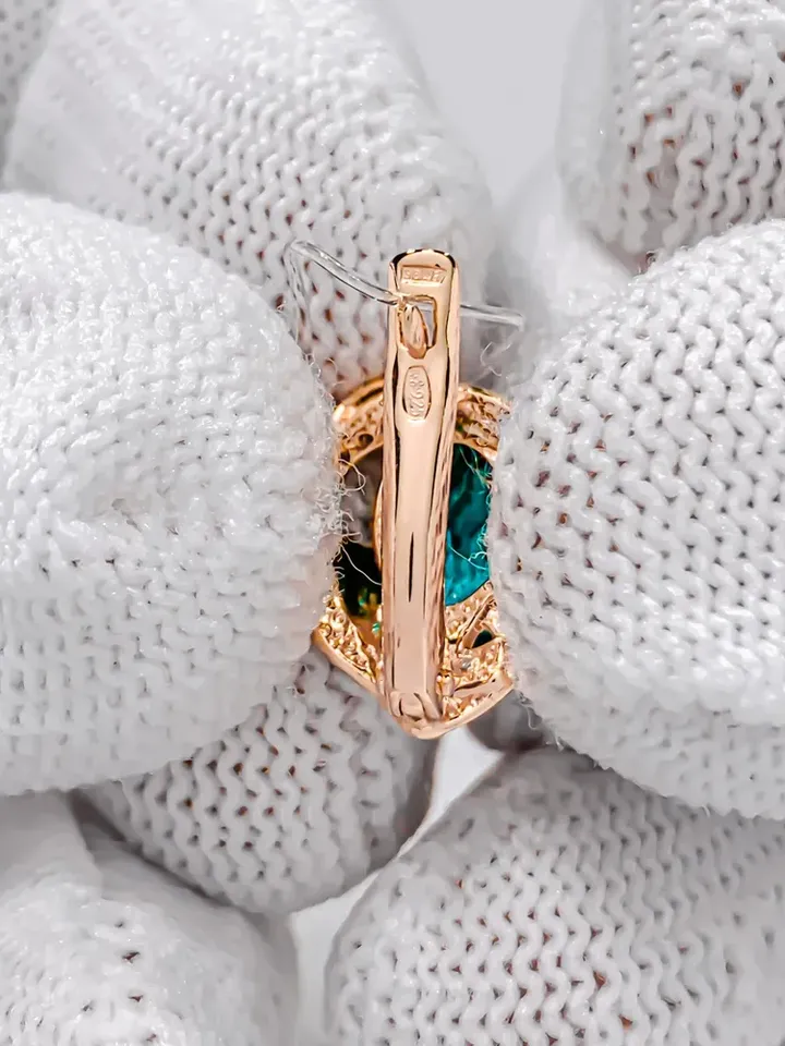 Earrings made of 925 silver (585 gold coating) with paraiba and white cubic zirconia