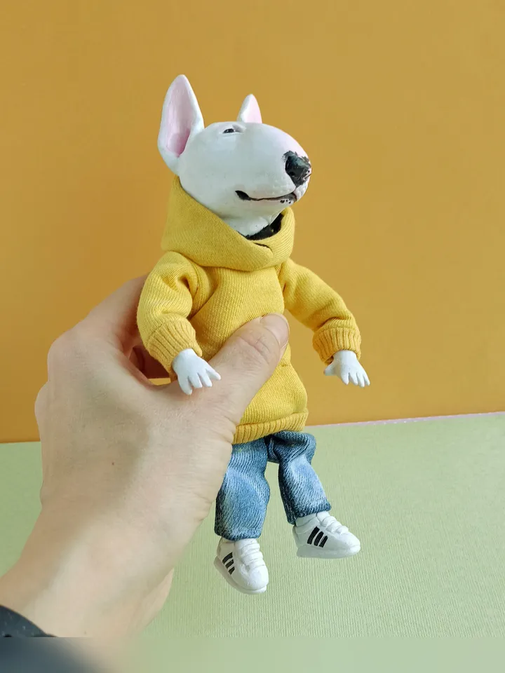 Bull Terrier doll in a yellow sweater
