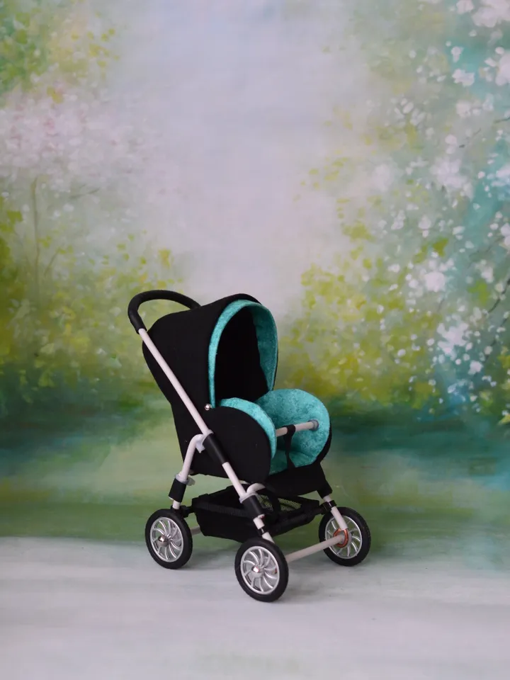 Miniature toy stroller for dolls in 1/6 scale. Accessories for small dolls and poupins. Pram for Barbie doll.