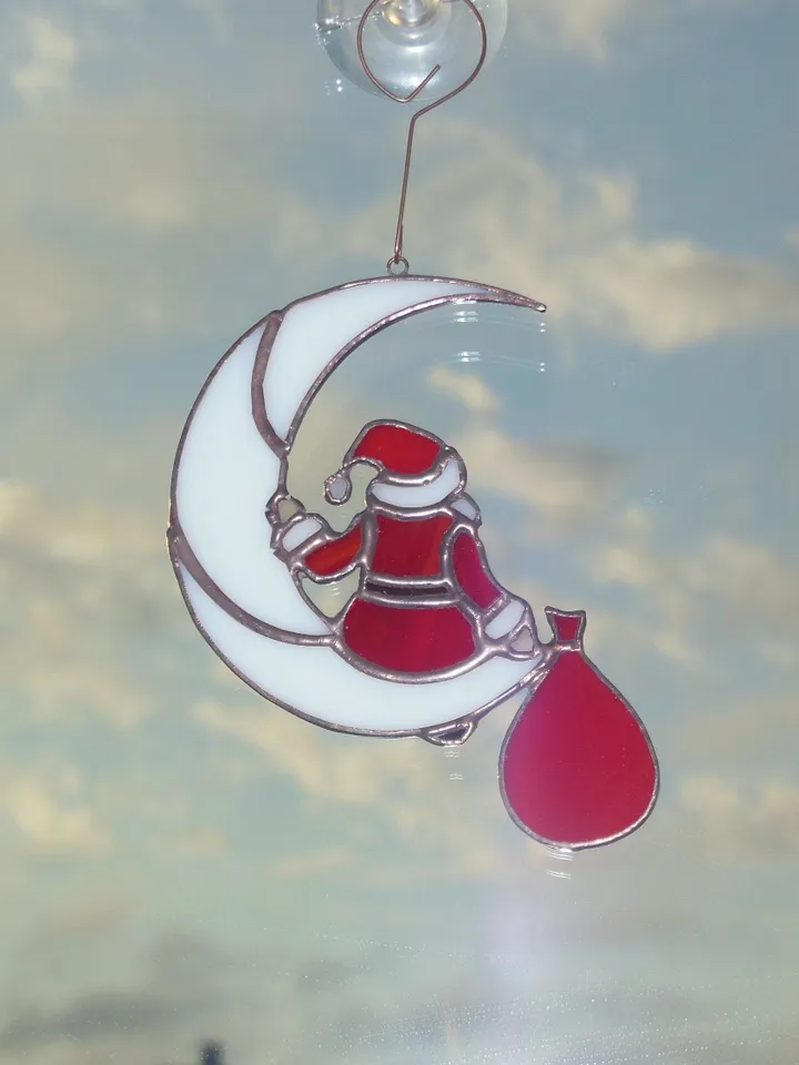 Santa Claus on the Moon . Idea for Christmas gift . Art stained glass window hanging Suncatcher , suspension Suncatcher . Red and White