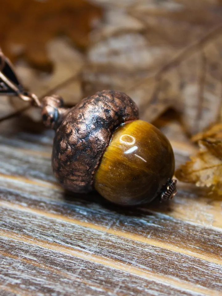 An original handmade electroformed copper pendant made from natural acorn caps in a single copy.