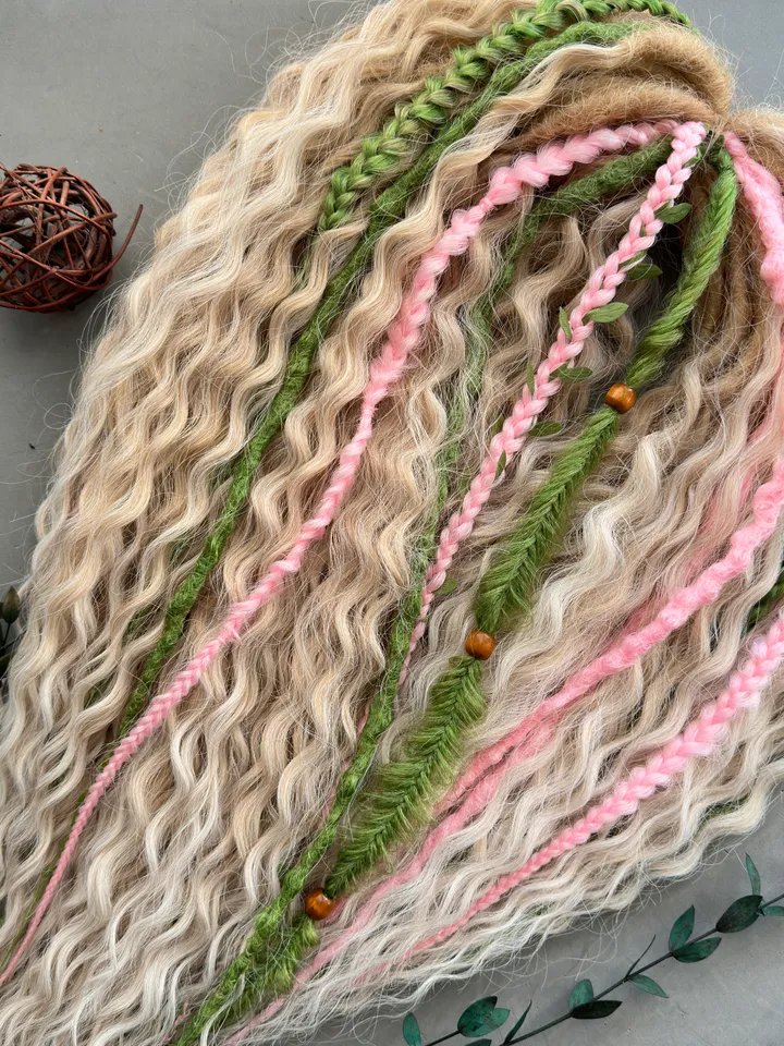Curly dreads, green dreads, pink braids