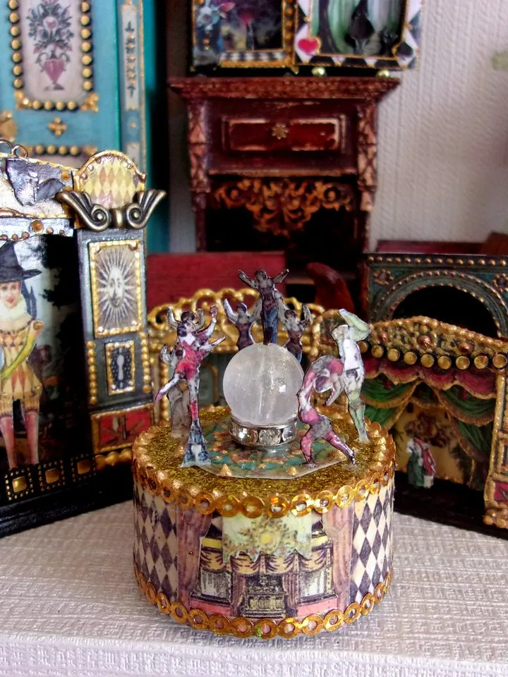 Mini circus with lights. acrobats on stage. LED candle