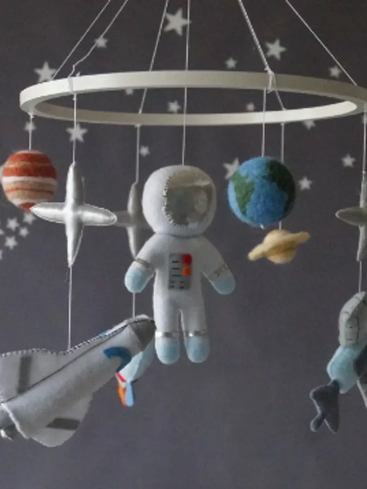 A space baby mobile. Spaceship and planets for boy's nursery decor,  outer space orbit handmade mobile