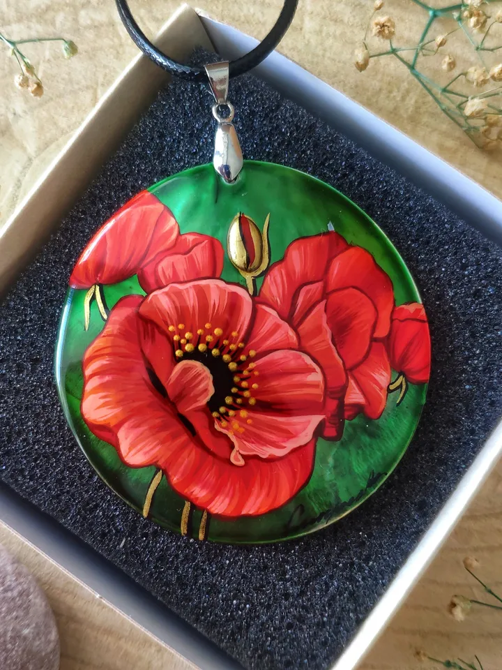 Floral Symphony: Captivating Red Poppy on Iridescent Green Nacre Pendant, a Stunning Blend of Nature and Artistry, Icon of Love and Passion