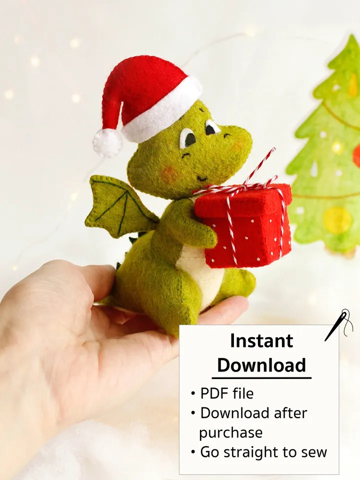 Felt green dragon with Christmas present hand sewing PDF tutorial with patterns, DIY Christmas tree ornament. Felt dinosaur toy pattern