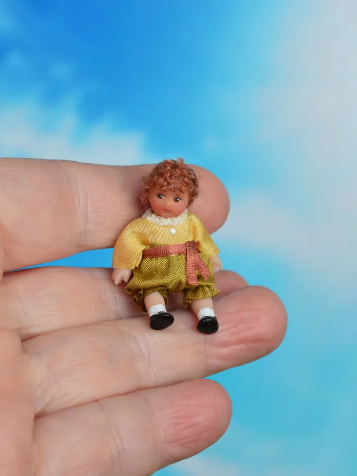 Miniature doll in 1/24 scale.  Doll toy to doll house.