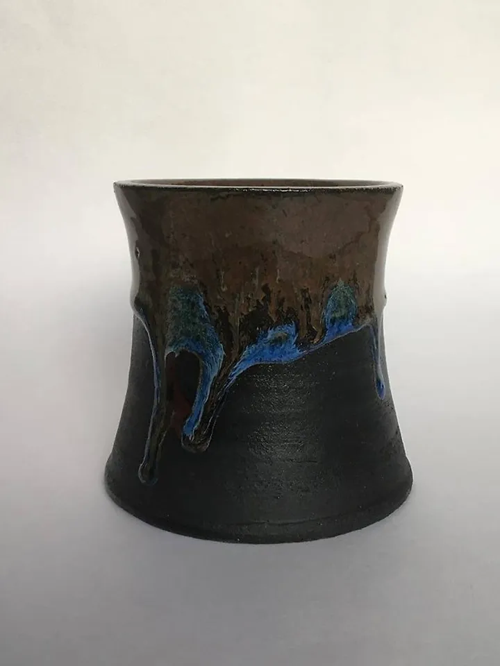 Brown, blue and black glazed stoneware mug