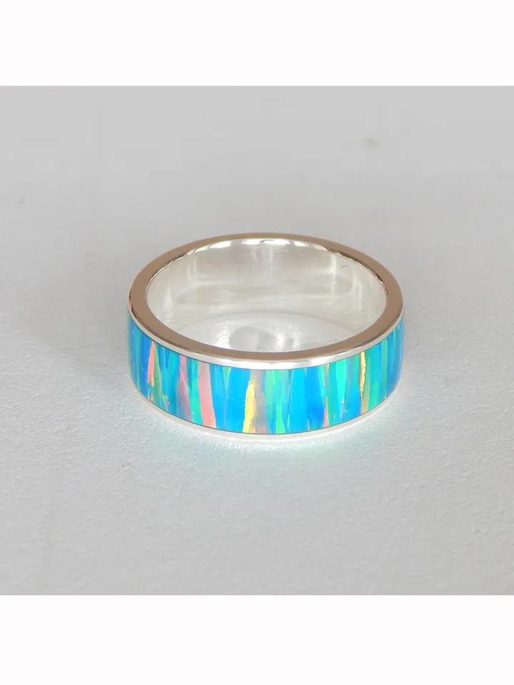 Silver ring with synthetic opal. Exclusive ring as a gift.
