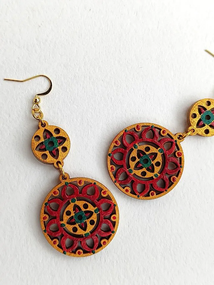 Bright ethnic earrings with hand painting