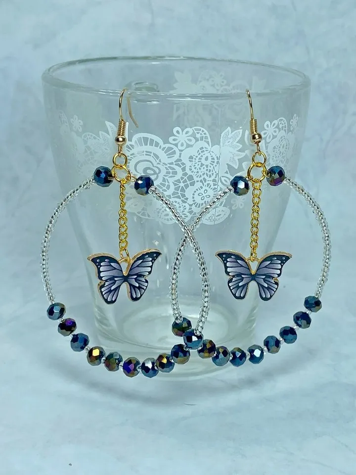 Earrings with butterflies. Handmade jewelry. Individual design.