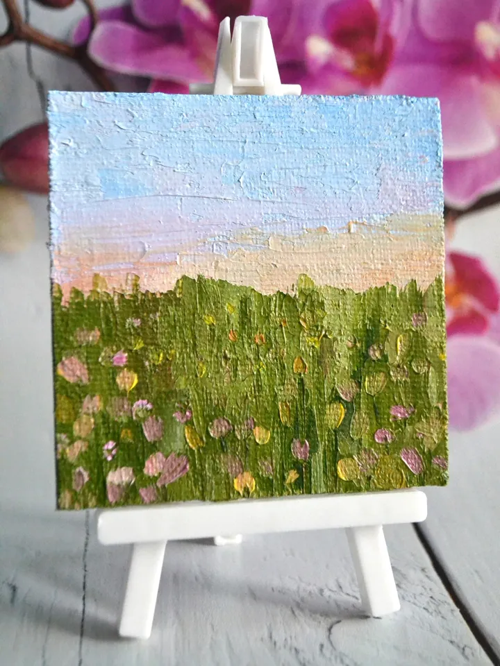 “Dawn” is a miniature oil painting on canvas stretched on cardboard.