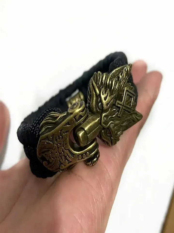 Paracord and bronze bracelet with wolf head