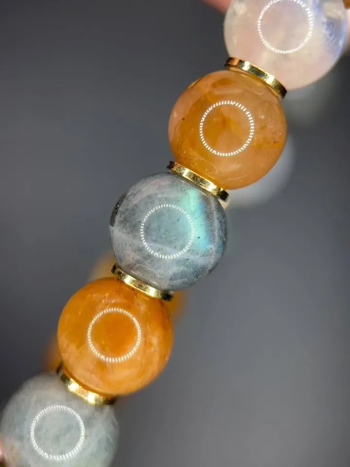 energy bracelet made of natural stones. Moonstone, labradorite, Himalayan azestulite