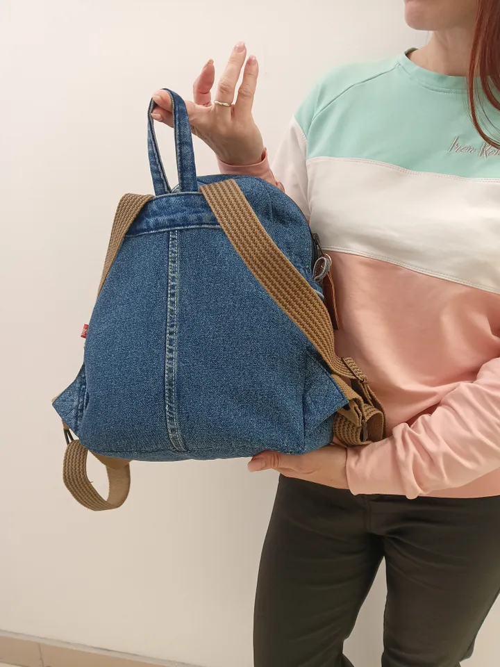 Stylish Denim backpack with 100 percent cotton lining, handmade, jeans recycling, 6 pockets.