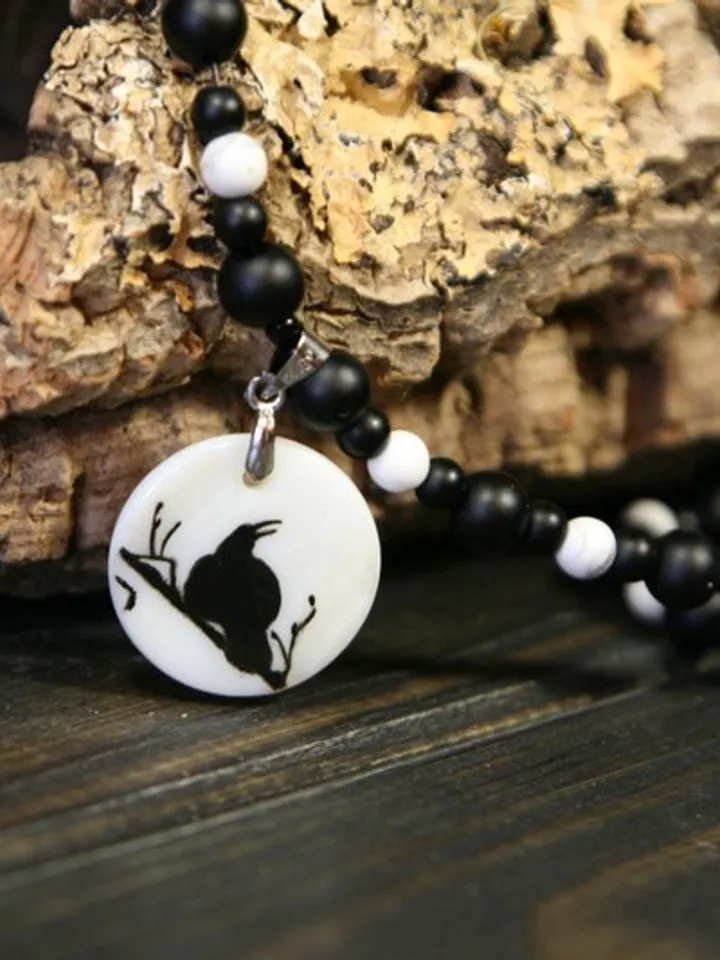 Raven or crow necklace with love rune on the other side. Nacre pearl pendant