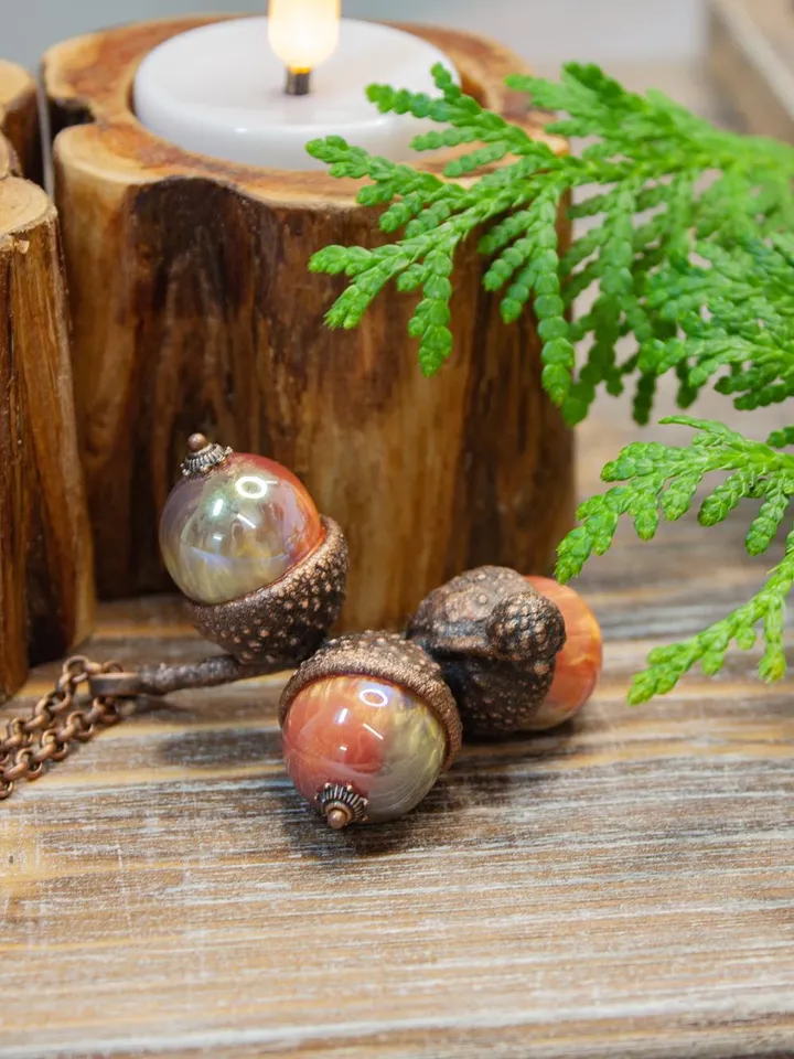 An original handmade electroformed copper pendant made from natural acorn caps in a single copy.