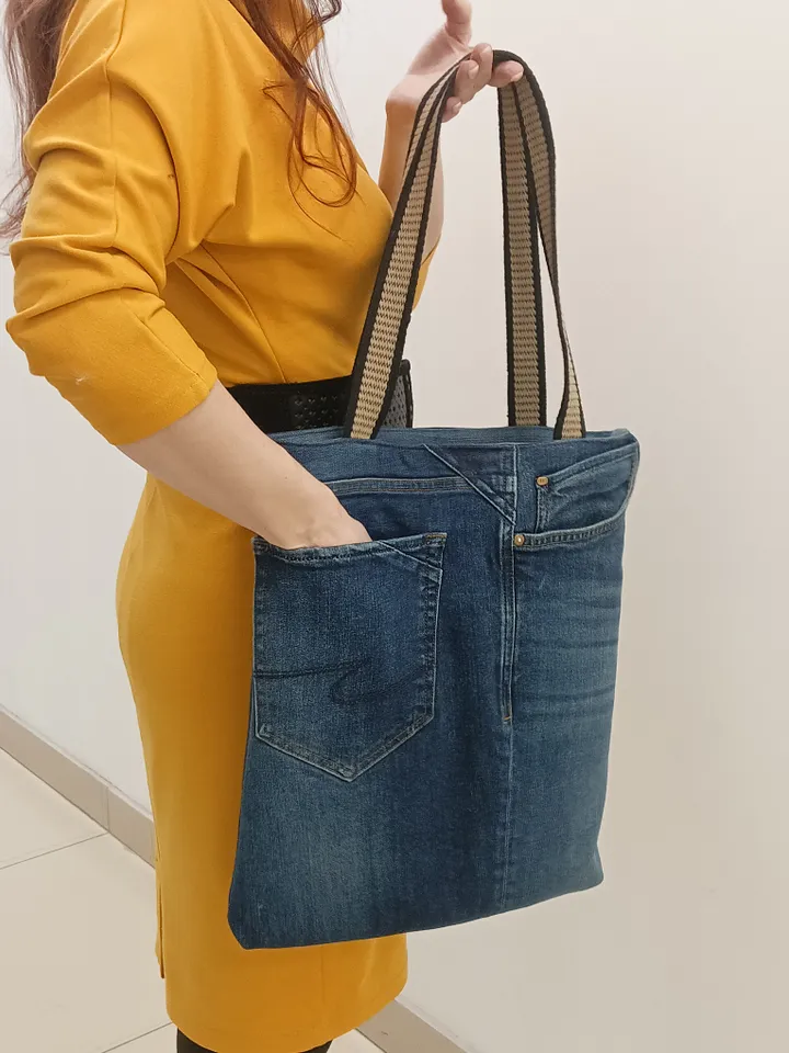 Denim market bag, tout, shopping bag, city bag, made from recycled jeans, with comfortable handles 24 inch long. Comfortable to wear on the shoulder. Bag with lining made of 100% cotton, 6 pockets and strong handles.