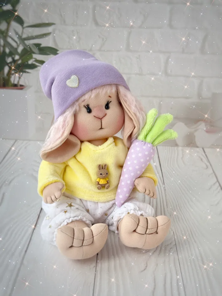Lovey bunny toy. Handmade cute stuffed rabbit with clothes and carrot. Soft rag bunny doll for Easter gift.