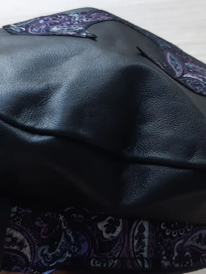 Beret of soft genuine leather with applique, decorated with a buckle. Leather hat for spring