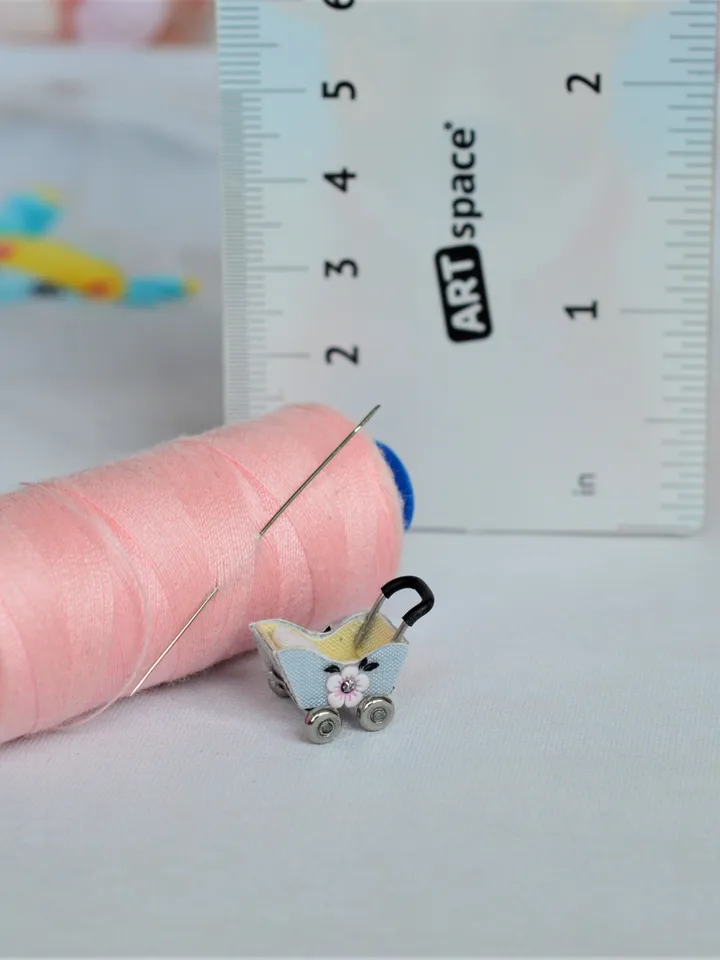 Miniature doll stroller. 1:48 scale. Dollhouse toy. Baby stroller.