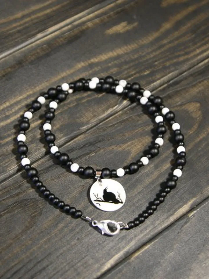 Raven or crow necklace with love rune on the other side. Nacre pearl pendant