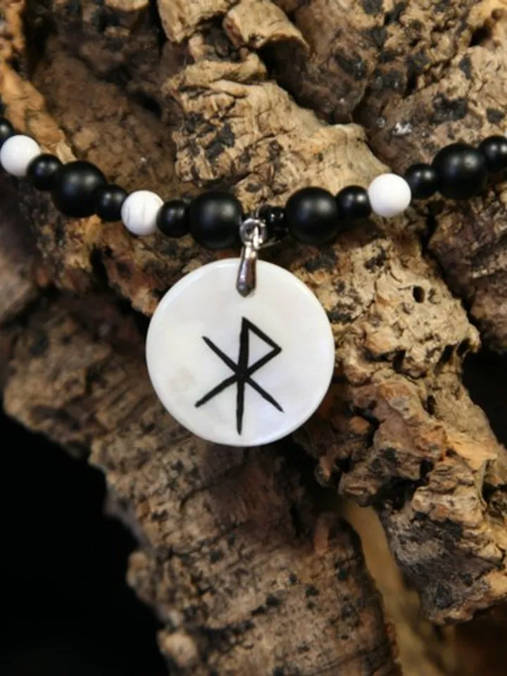 Raven or crow necklace with love rune on the other side. Nacre pearl pendant