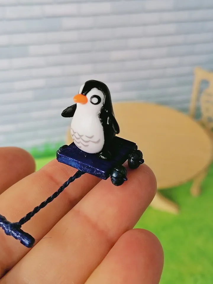 Penguin on a cart. Doll miniature.1:12.