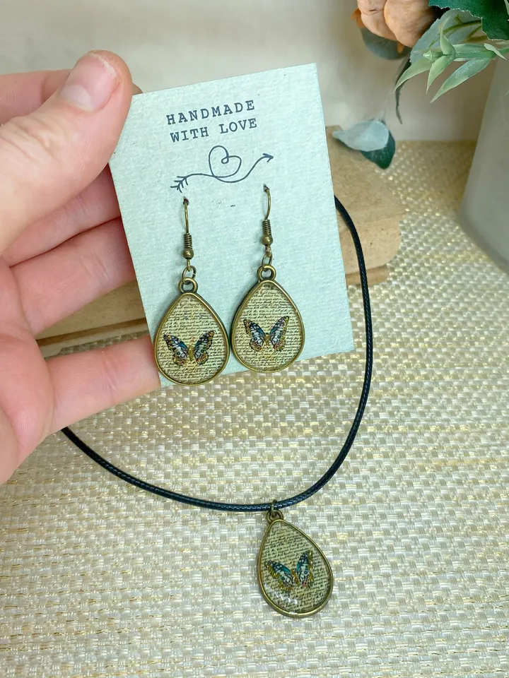 Handmade jewelry set. Shiny butterflies in a bronze frame. designer jewelry.