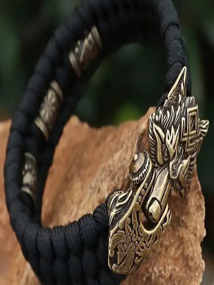 Paracord and bronze bracelet with wolf head