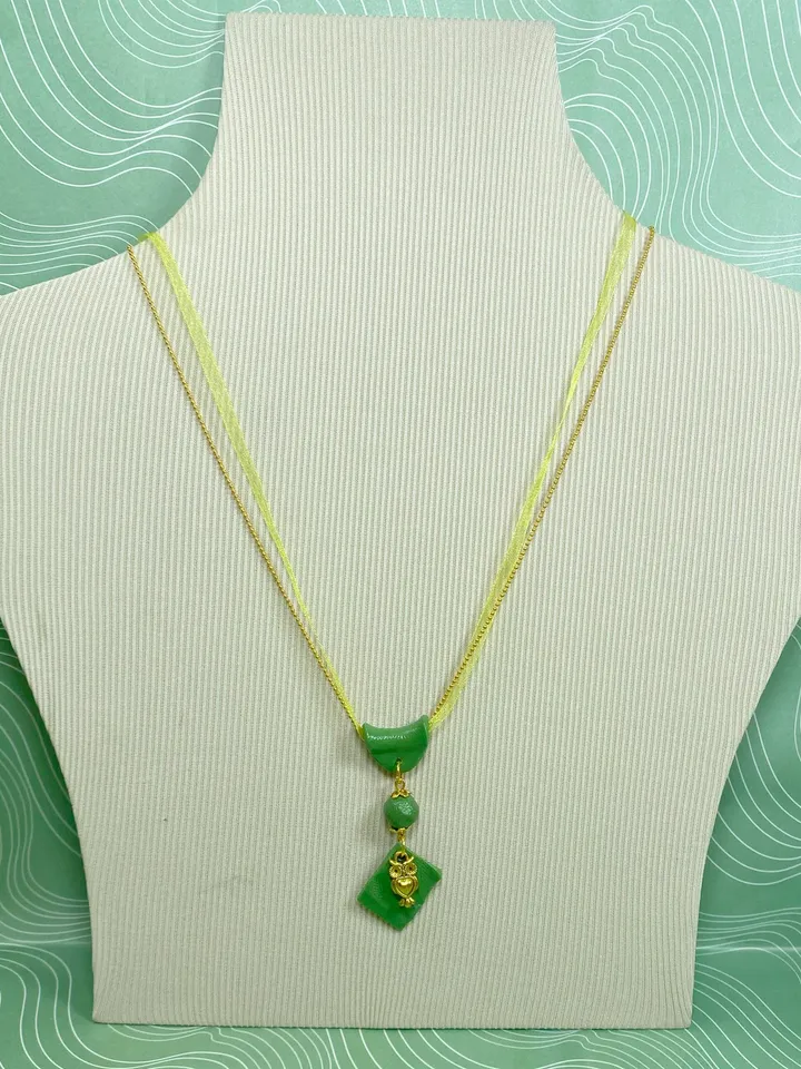 Handmade pendant on a chain. Handmade jewelry.